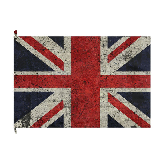 A rectangular Union Jack flag with a distressed, vintage-style print, featuring a red cross, navy blue corners, and an off-white cross with weathered texture. It has a small metal grommet on the left edge.